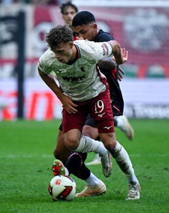 12.09.2026, xemx, Fussball 1.Bundesliga, FC Augsburg - Bayer 04 Leverkusen v.l. Robin Fellhauer (FC Augsburg), Equi Fernandez (Bayer 04 Leverkusen) Zweikampf, Aktion, action, battle for the ball (DFL DFB REGULATIONS PROHIBIT ANY USE OF PHOTOGRAPHS as IMAGE SEQUENCES and or QUASI-VIDEO) Augsburg *** September 12, 2026, xemx, Soccer, Bundesliga 1, FC Augsburg vs. Bayer 04 Leverkusen, Robin Fellhauer, FC Augsburg, Equi Fernandez, Bayer 04 Leverkusen, tackle, action, battle for the ball. DFL and DFB regulations prohibit any use of photographs as image sequences and or quasi-video. Augsburg