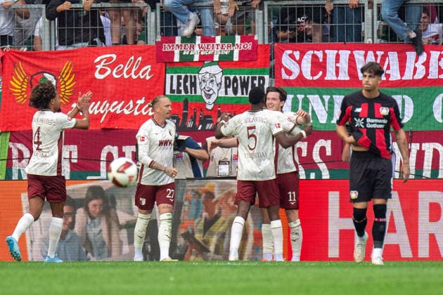 Han Noah Massengo (4 Augsburg) , Marius Wolf (27 Augsburg) , Chrislain Matsima (5 Augsburg) und Michael Gregoritsch (11 Augsburg) jubeln über das Tor zum 2-1 beim Bundesligaspiel FC Augsburg - Bayer 04 Leverkusen am 12.09.2026. Augsburg WWK Arena Bayern Deutschland *** Han Noah Massengo 4 Augsburg, Marius Wolf 27 Augsburg, Chrislain Matsima 5 (Augsburg) and Michael Gregoritsch 11 (Augsburg) celebrate the goal that made the score 2–1 during the Bundesliga match between FC Augsburg and Bayer 04 Leverkusen on September 12, 2026, at the WWK Arena in Augsburg, Bavaria, Germany