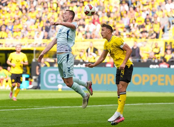 Tjark Scheller (SC Paderborn 07, 25) und Nico Schlotterbeck (Borussia Dortmund, 4) GER, Borussia Dortmund vs SC Paderborn 07, 1. Bundesliga, 3. Spieltag, Saison 2026-27, Signal Iduna Park, Dortmund, 12.09.2026 DFL REGULATIONS PROHIBIT ANY USE OF PHOTOGRAPHS AS IMAGE SEQUENCES AND OR QUASI-VIDEO GER, Borussia Dortmund vs SC Paderborn 07, 1. Bundesliga, 3. Spieltag, Saison 2026-27, 12.09.2026 Dortmund *** Tjark Scheller, SC Paderborn 07, 25, and Nico Schlotterbeck, Borussia Dortmund, 4 GER, Borussia Dortmund vs. SC Paderborn 07, 1 Bundesliga, Matchday 3, 2026–27 season, Signal Iduna Park, Dortmund, September 12, 2026. DFL regulations prohibit any use of photographs as image sequences and or quasi-video. GER, Borussia Dortmund vs. SC Paderborn 07, Bundesliga 1, Matchday 3, 2026–27 season, September 12, 2026, Dortmund Copyright: xEibner-Pressefoto ScottxColemanx EP_SCN