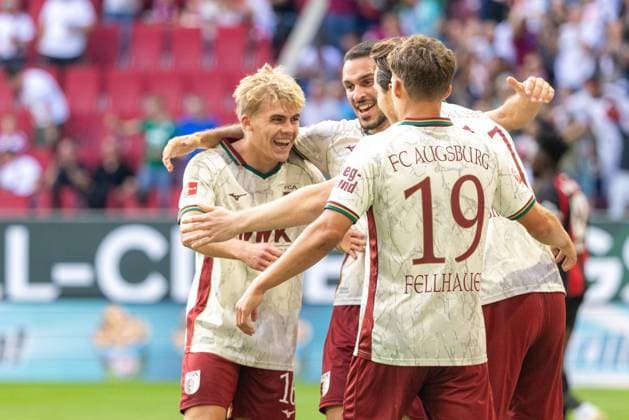 Torjubel, jubelt nach seinem Treffer zum 1:1 von Michael Gregoritsch (FC Augsburg), mit Hennes Behrens (FC Augsburg), Arijon Ibrahimovic (FC Augsburg) und Robin Fellhauer (FC Augsburg) v-lFC Augsburg vs. Bayer 04 Leverkusen, Fußball-Bundesliga, Fussball, 1. Bundesliga, 03. Spieltag, 12.09.2026 DFB regulations prohibit any use of photographs as image sequences and or quasi-video *** Goal celebration: Michael Gregoritsch (FC Augsburg) celebrates after scoring the 1-1 goal, alongside Hennes Behrens (FC Augsburg), Arijon Ibrahimovic (FC Augsburg), and Robin Fellhauer (FC Augsburg). FC Augsburg vs. Bayer 04 Leverkusen, Bundesliga, Soccer, Bundesliga 1, Matchday 3, September 12, 2026. DFB regulations prohibit any use of photographs as image sequences and or quasi-video. Copyright: xkolbert-press PeterxFastlx