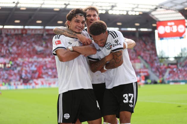 12.09.2026, Fussball Bundesliga, 1. FSV Mainz 05 - Eintracht Frankfurt, v.l., Torjubel zum 0:3 durch Can Uzun (Eintracht Frankfurt), Goal celebration, celebrate the goal, Robin Koch (Eintracht Frankfurt), Jeremiaha Maluze (Eintracht Frankfurt) DFL DFB REGULATIONS PROHIBIT ANY USE OF PHOTOGRAPHS AS IMAGE SEQUENCES AND OR QUASI-VIDEO. xdcx *** September 12, 2026, Bundesliga Soccer, 1. FSV Mainz 05 vs. Eintracht Frankfurt, from left, goal celebration for the 0-3 goal by Can Uzun of Eintracht Frankfurt, goal celebration, celebrating the goal, Robin Koch, Eintracht Frankfurt; Jeremiaha Maluze, Eintracht Frankfurt. DFL and DFB regulations prohibit any use of photographs as image sequences and or quasi-video. xdcx Copyright: HMBxMedia Claus