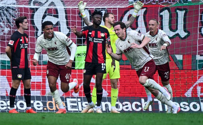 12.09.2026, xemx, Fussball 1.Bundesliga, FC Augsburg - Bayer 04 Leverkusen v.l. Michael Gregoritsch (FC Augsburg) Jubel, Torjubel, celebrate the goal, jubelt ueber das Tor zum 2:1 (DFL DFB REGULATIONS PROHIBIT ANY USE OF PHOTOGRAPHS as IMAGE SEQUENCES and or QUASI-VIDEO) Augsburg *** September 12, 2026, xemx, Soccer, Bundesliga 1, FC Augsburg vs. Bayer 04 Leverkusen – Michael Gregoritsch of FC Augsburg celebrates, Goal celebration, celebrating the goal, celebrating the 2–1 goal DFL DFB REGULATIONS PROHIBIT ANY USE OF PHOTOGRAPHS as IMAGE SEQUENCES and or QUASI-VIDEO Augsburg
