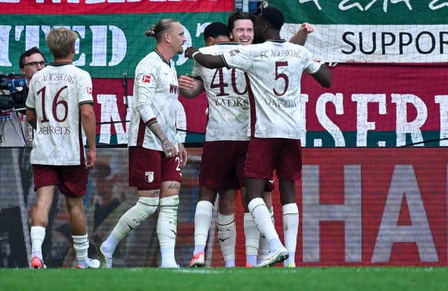 12.09.2026, xemx, Fussball 1.Bundesliga, FC Augsburg - Bayer 04 Leverkusen v.l. Michael Gregoritsch (FC Augsburg) Jubel, Torjubel, celebrate the goal, jubelt ueber das Tor zum 2:1 (DFL DFB REGULATIONS PROHIBIT ANY USE OF PHOTOGRAPHS as IMAGE SEQUENCES and or QUASI-VIDEO) Augsburg *** September 12, 2026, xemx, Soccer, Bundesliga 1, FC Augsburg vs. Bayer 04 Leverkusen – Michael Gregoritsch of FC Augsburg celebrates, Goal celebration, celebrating the goal, celebrating the 2–1 goal DFL DFB REGULATIONS PROHIBIT ANY USE OF PHOTOGRAPHS as IMAGE SEQUENCES and or QUASI-VIDEO Augsburg