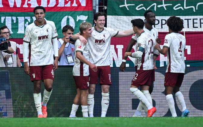12.09.2026, xemx, Fussball 1.Bundesliga, FC Augsburg - Bayer 04 Leverkusen v.l. Michael Gregoritsch (FC Augsburg) Jubel, Torjubel, celebrate the goal, jubelt ueber das Tor zum 2:1 (DFL DFB REGULATIONS PROHIBIT ANY USE OF PHOTOGRAPHS as IMAGE SEQUENCES and or QUASI-VIDEO) Augsburg *** September 12, 2026, xemx, Soccer, Bundesliga 1, FC Augsburg vs. Bayer 04 Leverkusen – Michael Gregoritsch of FC Augsburg celebrates, Goal celebration, celebrating the goal, celebrating the 2–1 goal DFL DFB REGULATIONS PROHIBIT ANY USE OF PHOTOGRAPHS as IMAGE SEQUENCES and or QUASI-VIDEO Augsburg