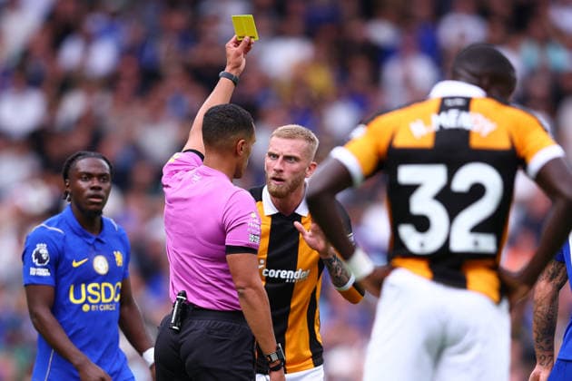 London, England, 12th September 2026. Oliver McBurnie of Hull City is shown a yellow card during the Chelsea vs Hull City Premier League match at Stamford Bridge, London. Picture credit should read: Paul Terry Sportimage EDITORIAL USE ONLY. No use with unauthorised audio, video, data, fixture lists, club league logos or live services. Online in-match use limited to 120 images, no video emulation. No use in betting, games or single club league player publications. SPI_008_PT_Chelsea_Hull SPI-4991-0008