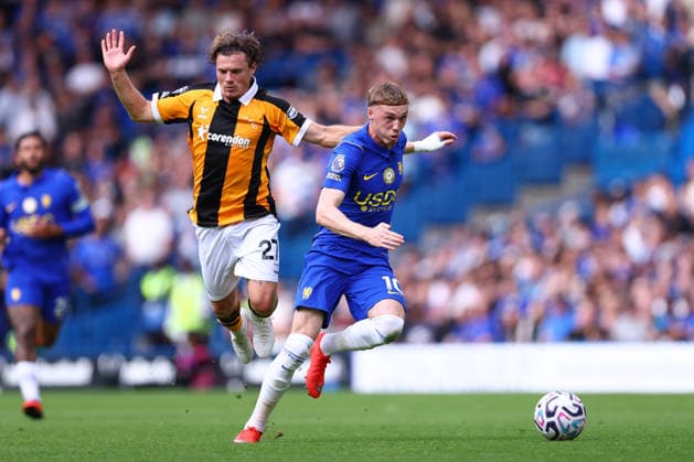 London, England, 12th September 2026. Regan Slater of Hull City and Cole Palmer of Chelsea challenge for the ball during the Chelsea vs Hull City Premier League match at Stamford Bridge, London. Picture credit should read: Paul Terry Sportimage EDITORIAL USE ONLY. No use with unauthorised audio, video, data, fixture lists, club league logos or live services. Online in-match use limited to 120 images, no video emulation. No use in betting, games or single club league player publications. SPI_009_PT_Chelsea_Hull SPI-4991-0009