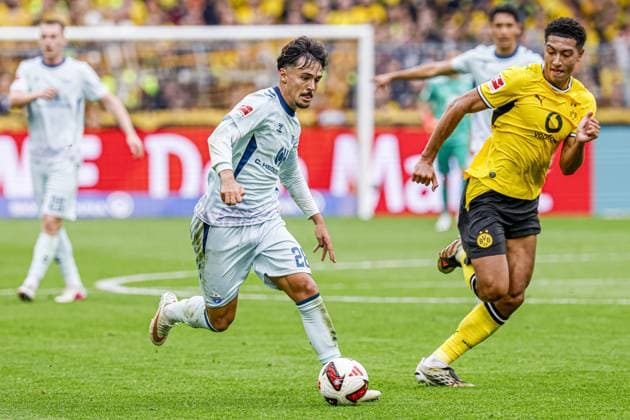 DORTMUND - Laurin Ulrich of SC Paderborn 07 battles for possession with Jobe Bellingham of Borussia Dortmund during the Bundesliga match between Borussia Dortmund and SC Paderborn 07 at Signal Iduna Park on September 12, 2026, in Dortmund, Germany. MARCEL TER BALS ANP Bundesliga 2026 27 xVIxANPxSportx xMarcelxterxBalsxIVx 568304992 originalFilename: 568304992.jpg