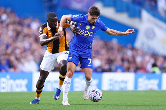 London, England, 12th September 2026. Nobel Mendy of Hull City and Pedro Neto of Chelsea challenge for the ball during the Chelsea vs Hull City Premier League match at Stamford Bridge, London. Picture credit should read: Paul Terry Sportimage EDITORIAL USE ONLY. No use with unauthorised audio, video, data, fixture lists, club league logos or live services. Online in-match use limited to 120 images, no video emulation. No use in betting, games or single club league player publications. SPI_015_PT_Chelsea_Hull SPI-4991-0015