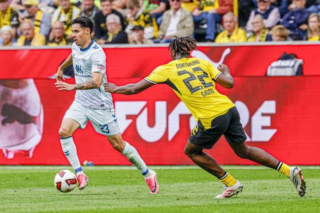 DORTMUND - Raphael Obermair of SC Paderborn 07 battles for possession with Joane Gadou of Borussia Dortmund during the Bundesliga match between Borussia Dortmund and SC Paderborn 07 at Signal Iduna Park on September 12, 2026, in Dortmund, Germany. MARCEL TER BALS ANP Bundesliga 2026 27 xVIxANPxSportx xMarcelxterxBalsxIVx 568305119 originalFilename: 568305119.jpg