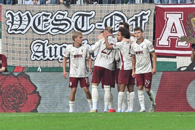 1. Fussball Bundesliga: FC Augsburg - Bayer 04 Leverkusen, 12.09.2026 AUGSBURG, GERMANY; 12. SEPTEMBER: Jubel der Augsburger nach dem Treffer zum 1-1 durch Michael GREGORITSCH (FC Augsburg 11) Tor Torschuetze Freude Happy während dem Match der Bundesliga zwischen dem FC Augsburg und Bayer 04 Leverkusen am 3. Spieltag in der WWK-Arena DFL REGULATIONS PROHIBIT ANY USE OF PHOTOGRAPHS AS IMAGE SEQUENCES AND OR QUASI-VIDEO *** 1 Bundesliga: FC Augsburg vs. Bayer 04 Leverkusen, September 12, 2026, AUGSBURG, GERMANY September 12: Augsburg fans celebrate after Michael GREGORITSCH scores the 1–1 goal. FC Augsburg 11 Goal Scorer Joy Happy during the Bundesliga match between FC Augsburg and Bayer 04 Leverkusen on Matchday 3 at the WWK Arena DFL regulations prohibit any use of photographs as image sequences and or quasi-video Copyright: xBEAUTIFULxSPORTS Goldbergx