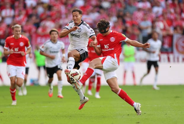 12.09.2026, Fussball Bundesliga, 1. FSV Mainz 05 - Eintracht Frankfurt, v.l., Younes Ebnoutalib (Eintracht Frankfurt), Fabio Gruber (FSV Mainz 05) DFL DFB REGULATIONS PROHIBIT ANY USE OF PHOTOGRAPHS AS IMAGE SEQUENCES AND OR QUASI-VIDEO. xdcx *** September 12, 2026, Bundesliga Soccer, 1 FSV Mainz 05 vs. Eintracht Frankfurt, from left: Younes Ebnoutalib (Eintracht Frankfurt), Fabio Gruber, FSV Mainz 05. DFL and DFB regulations prohibit any use of photographs as image sequences and or quasi-video. xdcx Copyright: HMBxMedia Claus