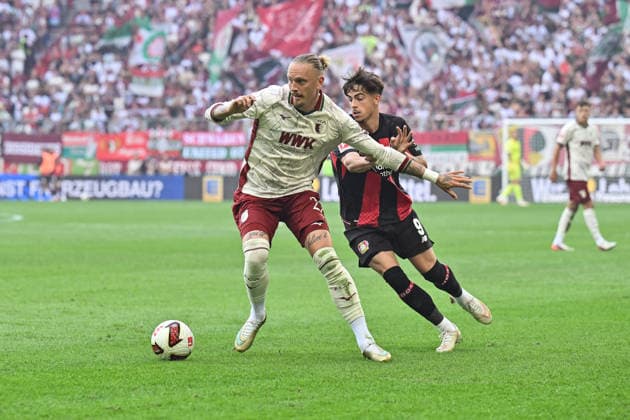 1. Fussball Bundesliga: FC Augsburg - Bayer 04 Leverkusen, 12.09.2026 AUGSBURG, GERMANY; 12. SEPTEMBER: im Duell Marius WOLF (FC Augsburg 27) und Afonso MOREIRA (Bayer Leverkusen 9) während dem Match der Bundesliga zwischen dem FC Augsburg und Bayer 04 Leverkusen am 3. Spieltag in der WWK-Arena DFL REGULATIONS PROHIBIT ANY USE OF PHOTOGRAPHS AS IMAGE SEQUENCES AND OR QUASI-VIDEO *** 1 Bundesliga: FC Augsburg vs. Bayer 04 Leverkusen, September 12, 2026, AUGSBURG, GERMANY, September 12: Marius WOLF (FC Augsburg, No. 27) and Afonso MOREIRA (Bayer Leverkusen, No. 9) face off during the Bundesliga match between FC Augsburg and Bayer 04 Leverkusen on Matchday 3 at the WWK Arena. DFL REGULATIONS PROHIBIT ANY USE OF PHOTOGRAPHS AS IMAGE SEQUENCES AND OR QUASI-VIDEO Copyright: xBEAUTIFULxSPORTS Goldbergx