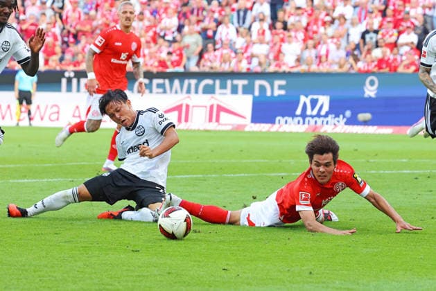 Mainz, Deutschland 12. September 2026: 1. BL - 2026 2027 - Sp. 3 - 1. FSV Mainz 05 gegen Eintracht Frankfurt Im Bild: v. li. im Zweikampf Keita Kosugi (Frankfurt)gegen Kaishu Sano (FSV). DFL regulations prohibit any use of photographs as image sequences and or quasi-video Mewa Arena Rheinland - Pfalz *** Mainz, Germany September 12, 2026 Bundesliga 2026–2027 Matchday 3: 1. Bundesliga: FSV Mainz 05 vs. Eintracht Frankfurt. Pictured, from left, in a tackle: Keita Kosugi (Frankfurt) vs. Kaishu Sano (FSV). DFL regulations prohibit any use of photographs as image sequences and or quasi- video footage. Mewa Arena, Rhineland-Palatinate Copyright: xFotostandx xRacochax