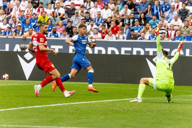 12.09.2026, xdaymx, Fussball 1.Bundesliga, TSG 1899 Hoffenheim - VfB Stuttgart. vl. Jeff Chabot (VfB Stuttgart) versucht vergeblich Adam Hlozek (TSG Hoffenheim) am Torschuss zu hindern, der anschließend Fabian Bredlow (VfB Stuttgart) überwindet und zur 2:1 Führung trifft. (DFL DFB REGULATIONS PROHIBIT ANY USE OF PHOTOGRAPHS as IMAGE SEQUENCES and or QUASI-VIDEO) Sinsheim *** September 12, 2026, xdaymx, Soccer, Bundesliga 1, TSG 1899 Hoffenheim vs. VfB Stuttgart, Referee: Jeff Chabot. VfB Stuttgart tries in vain to prevent Adam Hlozek of TSG Hoffenheim from taking a shot on goal, who then beats Fabian Bredlow of VfB Stuttgart to score the 2–1 lead. DFL and DFB regulations prohibit any use of photographs as image sequences and or quasi-video. Sinsheim