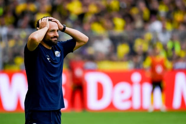 Trainer Ralf Kettemann (SC Paderborn 07) gestikuliert waehrend des spiels der 1. Bundesliga zwischen Borussia Dortmund und SC Paderborn 07, Signal Iduna Park am 12. September 2026 in Dortmund, Deutschland. (Foto von Max Maiwald DeFodi Images) +++ Trainer Ralf Kettemann (SC Paderborn 07) gestures during the Bundesliga match between Borussia Dortmund and SC Paderborn 07 at Signal Iduna Park on September 12, 2026 in Dortmund, Germany. (Photo by Max Maiwald DeFodi Images) DFB DFL REGULATIONS PROHIBIT ANY USE OF PHOTOGRAPHS AS IMAGE SEQUENCES AND OR QUASI-VIDEO. (Photo by Max Maiwald DeFodi Images) - *** SC Paderborn 07 coach Ralf Kettemann gestures during the Bundesliga match between Borussia Dortmund and SC Paderborn 07 at Signal Iduna Park on September 12, 2026, in Dortmund, Germany. Photo by Max Maiwald, DeFodi Images. Coach Ralf Kettemann of SC Paderborn 07 gestures during the Bundesliga match between Borussia Dortmund and SC Paderborn 07 at Signal Iduna Park on September 12, 2026 in Dortmund, Germany. Photo by Max Maiwald, DeFodi Images. DFB and DFL regulations prohibit any use of photographs as image sequences and or quasi-video. Photo by Max Maiwald, DeFodi Images.