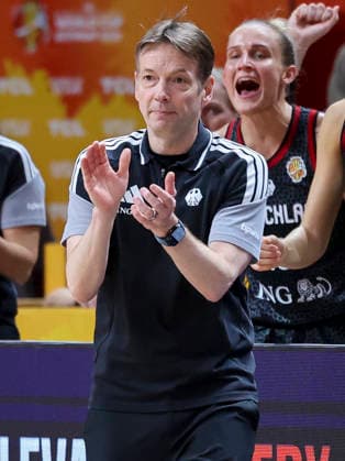 Bundestrainer Olaf Lange (Germany) cheers during the FIBA Women s Basketball World Cup Germany 2026 semifinals match between France and Germany at Berlin Arena on September 12, 2026 in Berlin, Germany. (Photo by Marco Steinbrenner DeFodi Images) -