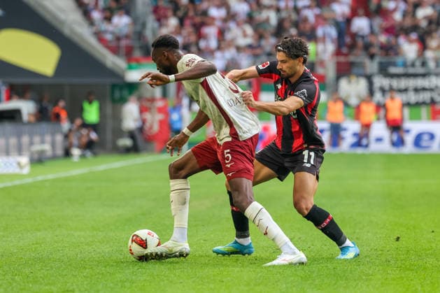 Chrislain Matsima (FC Augsburg, 05) mit Martin Terrier (Bayer 04 Leverkusen, 11), GER, FC Augsburg vs. Bayer 04 Leverkusen, Fussball, Bundesliga, 3. Spieltag, Saison 2026 2027, 12.09.2026, DFL DFB REGULATIONS PROHIBIT ANY USE OF PHOTOGRAPHS as IMAGE SEQUENCES and or QUASI-VIDEO, GER, FC Augsburg vs. Bayer 04 Leverkusen, Fussball, Bundesliga, 3. Spieltag, Saison 2026 2027, 12.09.2026 Augsburg *** Chrislain Matsima (FC Augsburg), No. 05, with Martin Terrier (Bayer 04 Leverkusen), No. 11, GER, FC Augsburg vs. Bayer 04 Leverkusen, Soccer, Bundesliga, Matchday 3, 2026–2027 season, September 12, 2026, DFL and DFB regulations prohibit any use of photographs as image sequences and or quasi-video, GER, FC Augsburg vs. Bayer 04 Leverkusen, soccer, Bundesliga, Matchday 3, 2026–2027 season, September 12, 2026, Augsburg Copyright: xEibner-Pressefoto JennixMaulx EP_JML