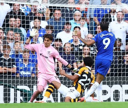 Joao Pedro of Chelsea scores their sides second goal past Konstantinos Tzolakis of Hull City Chelsea v Hull City, Premier League, Football, Football, Stamford Bridge, London, UK - 12 Sep 2026London Stamford Bridge United Kingdom EDITORIAL USE ONLY No use with unauthorised audio, video, data, fixture lists, club league logos or live services. Online in-match use limited to 120 images, no video emulation. No use in betting, games or single club league player publications.  Copyright: xMichaelxZemanek Shutterstockx 17144546ba