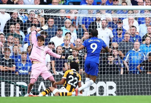 Joao Pedro of Chelsea scores their sides second goal past Konstantinos Tzolakis of Hull City Chelsea v Hull City, Premier League, Football, Football, Stamford Bridge, London, UK - 12 Sep 2026London Stamford Bridge United Kingdom EDITORIAL USE ONLY No use with unauthorised audio, video, data, fixture lists, club league logos or live services. Online in-match use limited to 120 images, no video emulation. No use in betting, games or single club league player publications.  Copyright: xMichaelxZemanek Shutterstockx 17144546bc