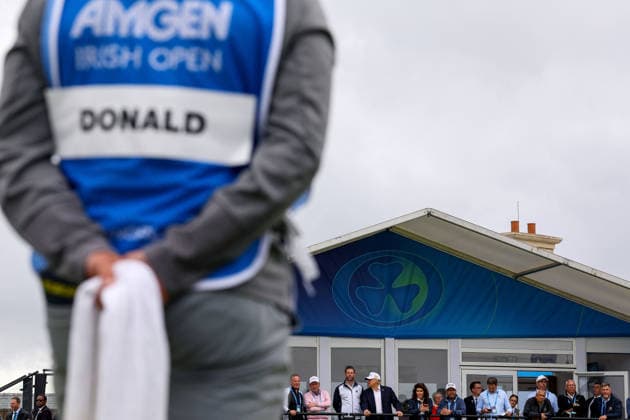 2026 Amgen Irish Open - Third Round, Trump International Golf Links, Doonbeg 12 9 2026 President of the United States of America Donald Trump watches over the eighteenth green with his son Eric Donald Trump watches over the eighteenth green with his son Eric 12 9 2026  Copyright: xx BB2_8052