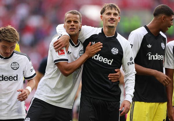 12.09.2026, Fussball Bundesliga, 1. FSV Mainz 05 - Eintracht Frankfurt, v.l., Timothy Chandler (Eintracht Frankfurt), Robin Koch (Eintracht Frankfurt) feiern mit den Fans, celebrate with the fans DFL DFB REGULATIONS PROHIBIT ANY USE OF PHOTOGRAPHS AS IMAGE SEQUENCES AND OR QUASI-VIDEO. xdcx *** September 12, 2026, Bundesliga Soccer, 1 FSV Mainz 05 vs. Eintracht Frankfurt, from left, Timothy Chandler, Eintracht Frankfurt, Robin Koch of Eintracht Frankfurt celebrating with the fans. DFL and DFB regulations prohibit any use of photographs as image sequences and or quasi-video. xdcx Copyright: HMBxMedia Claus