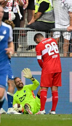 Deniz Undav VfB Stuttgart (26) hilft Torwart Oliver Baumann TSG 1899 Hoffenheim (01) bei Krampf TSG 1899 Hoffenheim vs VfB Stuttgart 12.09.2026 DFL REGULATIONS PROHIBIT ANY USE OF PHOTOGRAPHS AS IMAGE SEQUENCES AND OR QUASI-VIDEO TSG 1899 Hoffenheim vs VfB Stuttgart *** Deniz Undav (VfB Stuttgart 26) helps goalkeeper Oliver Baumann (TSG 1899 Hoffenheim 01) with a cramp; TSG 1899 Hoffenheim vs. VfB Stuttgart, September 12, 2026. DFL regulations prohibit any use of photographs AS IMAGE SEQUENCES AND OR QUASI-VIDEO TSG 1899 Hoffenheim vs. VfB Stuttgart