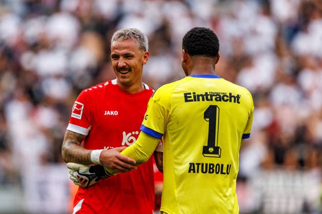 MAINZ, GERMANY - SEPTEMBER 12: Phillip Tietz (1. FSV Mainz 05, 9) and Noah Atubolu (Eintracht Frankfurt, 1) during the Bundesliga match between 1. FSV Mainz 05 vs. Eintracht Frankfurt at MEWA Arena on matchday 3 of the 1. Bundesliga on September 12, 2026 in Mainz, Germany. DFL REGULATIONS PROHIBIT ANY USE OF PHOTOGRAPHS AS IMAGE SEQUENCES AND OR QUASI-VIDEO. Rhineland-Palatinate Germany Copyright: xStephanxHahnex