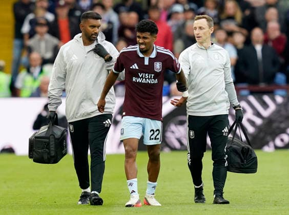 Birmingham, England, 12th September 2026. Ian Maatsen of Aston Villa leaves the game injured during the Aston Villa vs Nottingham Forest Premier League match at Villa Park, Birmingham. Picture credit should read: Andrew Yates Sportimage EDITORIAL USE ONLY. No use with unauthorised audio, video, data, fixture lists, club league logos or live services. Online in-match use limited to 120 images, no video emulation. No use in betting, games or single club league player publications. SPI_025_AY_Villa_Forest SPI-4990-0025