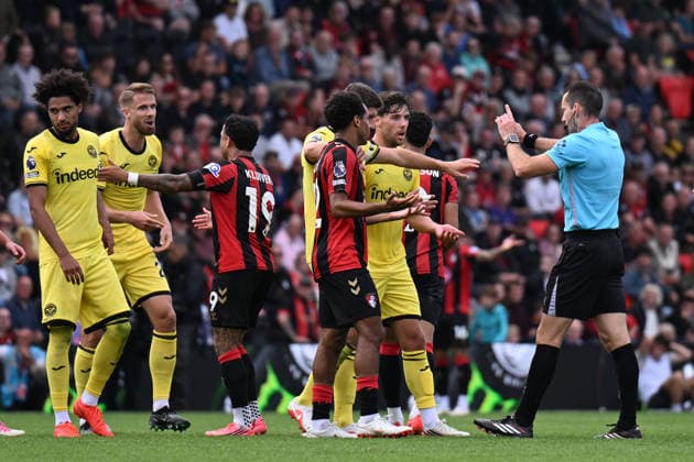 12th September 2026; Vitality Stadium, Bournemouth, England; Premier League Football, Bournemouth versus Brentford; referee Jarred Gillett deals with player protests SimonxWest