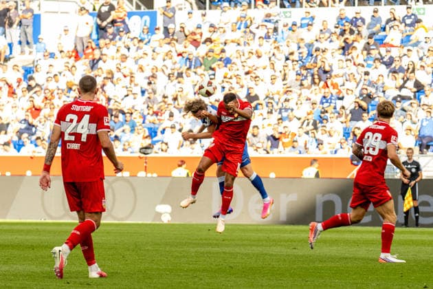 12.09.2026, xdaymx, Fussball 1.Bundesliga, TSG 1899 Hoffenheim - VfB Stuttgart. =vl. Wouter Burger (TSG Hoffenheim) im Kopfballduell mit Jamie Leweling (VfB Stuttgart). (DFL DFB REGULATIONS PROHIBIT ANY USE OF PHOTOGRAPHS as IMAGE SEQUENCES and or QUASI-VIDEO) Sinsheim *** September 12, 2026, xdaymx, Soccer, Bundesliga 1, TSG 1899 Hoffenheim vs. VfB Stuttgart: Wouter Burger (TSG Hoffenheim) in a header duel with Jamie Leweling (VfB Stuttgart). DFL, DFB regulations prohibit any use of photographs as image sequences and or quasi-video. Sinsheim