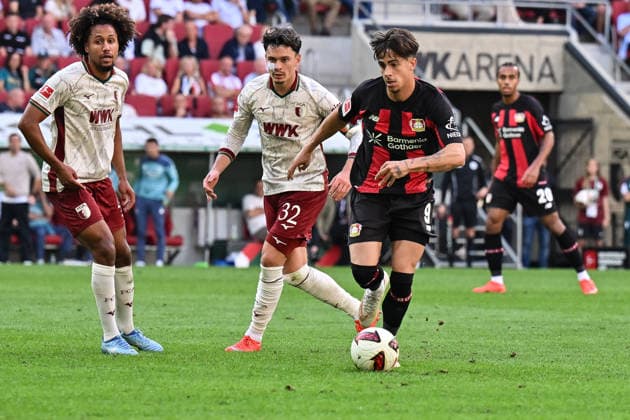 1. Fussball Bundesliga: FC Augsburg - Bayer 04 Leverkusen, 12.09.2026 AUGSBURG, GERMANY; 12. SEPTEMBER: v. l. Han-Noah MASSENGO (FC Augsburg 4), Felipe CHAVEZ (FC Bayern Munich 32) und Afonso MOREIRA (Bayer Leverkusen 9) während dem Match der Bundesliga zwischen dem FC Augsburg und Bayer 04 Leverkusen am 3. Spieltag in der WWK-Arena DFL REGULATIONS PROHIBIT ANY USE OF PHOTOGRAPHS AS IMAGE SEQUENCES AND OR QUASI-VIDEO *** 1 Bundesliga: FC Augsburg vs. Bayer 04 Leverkusen, September 12, 2026, AUGSBURG, GERMANY, September 12. From left: Han Noah MASSENGO (FC Augsburg) 4, Felipe CHAVEZ, FC Bayern Munich 32, and Afonso MOREIRA, Bayer Leverkusen 9, during the Bundesliga match between FC Augsburg and Bayer 04 Leverkusen on Matchday 3 at the WWK Arena. DFL REGULATIONS PROHIBIT ANY USE OF PHOTOGRAPHS AS IMAGE SEQUENCES AND OR QUASI-VIDEO Copyright: xBEAUTIFULxSPORTS Goldbergx