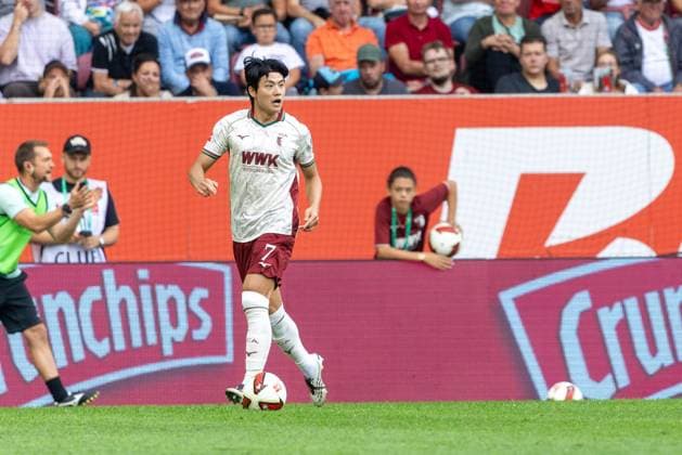 Youngwoo Seol (FC Augsburg) in Aktion, FC Augsburg vs. Bayer 04 Leverkusen, Fußball-Bundesliga, Fussball, 1. Bundesliga, 03. Spieltag, 12.09.2026 DFB regulations prohibit any use of photographs as image sequences and or quasi-video *** Youngwoo Seol of FC Augsburg in action, FC Augsburg vs. Bayer 04 Leverkusen, Bundesliga Soccer, Soccer, 1st Bundesliga, Matchday 3, September 12, 2026. DFB regulations prohibit any use of photographs as image sequences and or quasi-video. Copyright: xkolbert-press PeterxFastlx