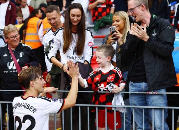 David Affengruber of Fulham with a fan at the end of the match Liverpool v Fulham, Premier League, Football, Football, Anfield, Liverpool, UK - 12 Sep 2026Liverpool Anfield United Kingdom EDITORIAL USE ONLY No use with unauthorised audio, video, data, fixture lists, club league logos or live services. Online in-match use limited to 120 images, no video emulation. No use in betting, games or single club league player publications.  Copyright: xMattxWest Shutterstockx 17144551bs