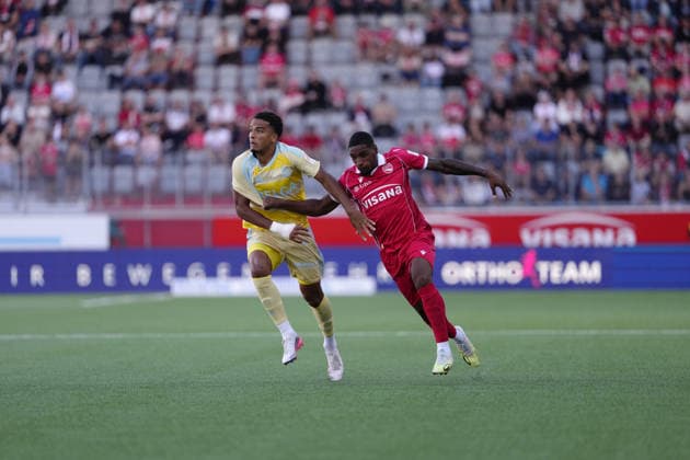 Thun, Switzerland - September 12: Yannick Bettkober (58 GCZ) against Brighton Labeau (96 THU) during the Brack Super League match between FC Thun and Grasshopper Club Zürich at VISANA STADION on September 12, 2026 in Thun, Switzerland. Copyright: xKjetilxWaberx xSPPx Sportspressphoto_SPR228719