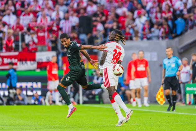 Gideon Mensah (1.FC Koeln, 14) im Zweikampf mit Arthur (SV Werder Bremen, 13) 1.FC Köln vs. SV Werder Bremen, Fussball, Bundesliga, 3.Spieltag, Saison 2026 27, 12.09.2026, DFL REGULATIONS PROHIBIT ANY USE OF PHOTOGRAPHS AS IMAGE SEQUENCES AND OR QUASI-VIDEO, 1.FC Köln vs. SV Werder Bremen, Fussball, Bundesliga, 3.Spieltag, Saison 2026 27, 12.09.2026 Köln *** Gideon Mensah, 1. FC Köln, No. 14, in a tackle with Arthur, SV Werder Bremen, No. 13; 1. FC Köln vs. SV Werder Bremen, soccer, Bundesliga, Matchday 3, 2026–27 season, September 12, 2026, DFL regulations prohibit any use of photographs as image sequences and or quasi-video, 1. FC Köln vs. SV Werder Bremen, soccer, Bundesliga, Matchday 3, 2026–27 season, September 12, 2026, Cologne Copyright: xEibner-Pressefoto LukasxBaldygax EP_LBA