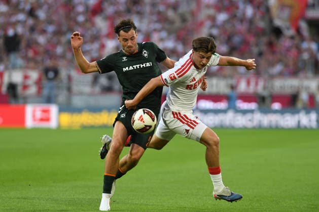 Olivier Deman (Werder Bremen) und Mikey Moore (1. FC Koeln) im Zweikampf waehrend des Spiels der 1. Bundesliga zwischen 1. FC Koeln und SV Werder Bremen, RheinEnergieStadion am 12. September 2026 in Koeln, Deutschland. (Foto von Ralf Treese DeFodi Images) +++ Olivier Deman (Werder Bremen) und Mikey Moore (1. FC Koeln) battle for the ball during the Bundesliga match between 1. FC Koeln and SV Werder Bremen at RheinEnergieStadion on September 12, 2026 in Cologne, Germany. (Photo by Ralf Treese DeFodi Images) DFB DFL REGULATIONS PROHIBIT ANY USE OF PHOTOGRAPHS AS IMAGE SEQUENCES AND OR QUASI-VIDEO. (Photo by Ralf Treese DeFodi Images) - *** Olivier Deman of Werder Bremen and Mikey Moore of 1. FC Köln battle for the ball during the Bundesliga match between 1. FC Köln and SV Werder Bremen at RheinEnergieStadion on September 12, 2026, in Cologne, Germany Photo by Ralf Treese DeFodi Images Olivier Deman of Werder Bremen and Mikey Moore of 1. FC Köln battle for the ball during the Bundesliga match between 1. FC Köln and SV Werder Bremen at RheinEnergieStadion on September 12, 2026 in Cologne, Germany. Photo by Ralf Treese, DeFodi Images. DFB and DFL regulations prohibit any use of photographs as image sequences and or quasi-video. Photo by Ralf Treese, DeFodi Images
