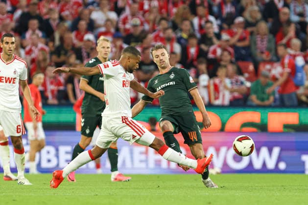 Linton Maina (1. FC Koeln) und Youri Regeer (SV Werder Bremen) im Zweikampf waehrend des Spiels der 1. Bundesliga zwischen 1. FC Koeln und SV Werder Bremen, RheinEnergieStadion am 12. September 2026 in Koeln, Deutschland. (Foto von Oliver Kaelke DeFodi Images) +++ Linton Maina (1. FC Koeln) und Youri Regeer (SV Werder Bremen) battle for the ball during the Bundesliga match between 1. FC Koeln and SV Werder Bremen at RheinEnergieStadion on September 12, 2026 in Cologne, Germany. (Photo by Oliver Kaelke DeFodi Images) DFB DFL REGULATIONS PROHIBIT ANY USE OF PHOTOGRAPHS AS IMAGE SEQUENCES AND OR QUASI-VIDEO. (Photo by Oliver Kaelke DeFodi Images) - *** Linton Maina of 1. FC Köln and Youri Regeer of SV Werder Bremen battle for the ball during the Bundesliga match between 1. FC Köln and SV Werder Bremen at the RheinEnergieStadion on September 12, 2026, in Cologne, Germany Photo by Oliver Kaelke, DeFodi Images Linton Maina of 1. FC Köln and Youri Regeer of SV Werder Bremen battle for the ball during the Bundesliga match between 1. FC Köln and SV Werder Bremen at RheinEnergieStadion on September 12, 2026 in Cologne, Germany. Photo by Oliver Kaelke, DeFodi Images. DFB and DFL regulations prohibit any use of photographs as image sequences and or quasi-video. Photo by Oliver Kaelke, DeFodi Images.