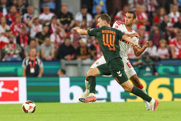 Youri Regeer (SV Werder Bremen) und Ellyes Skhiri (1. FC Koeln) im Zweikampf waehrend des Spiels der 1. Bundesliga zwischen 1. FC Koeln und SV Werder Bremen, RheinEnergieStadion am 12. September 2026 in Koeln, Deutschland. (Foto von Oliver Kaelke DeFodi Images) +++ Youri Regeer (SV Werder Bremen) und Ellyes Skhiri (1. FC Koeln) battle for the ball during the Bundesliga match between 1. FC Koeln and SV Werder Bremen at RheinEnergieStadion on September 12, 2026 in Cologne, Germany. (Photo by Oliver Kaelke DeFodi Images) DFB DFL REGULATIONS PROHIBIT ANY USE OF PHOTOGRAPHS AS IMAGE SEQUENCES AND OR QUASI-VIDEO. (Photo by Oliver Kaelke DeFodi Images) - *** Youri Regeer of SV Werder Bremen and Ellyes Skhiri of 1. FC Köln battle for the ball during the Bundesliga match between 1. FC Köln and SV Werder Bremen at the RheinEnergieStadion on September 12, 2026, in Cologne, Germany Photo by Oliver Kaelke, DeFodi Images Youri Regeer of SV Werder Bremen and Ellyes Skhiri of 1. FC Köln battle for the ball during the Bundesliga match between 1. FC Köln and SV Werder Bremen at RheinEnergieStadion on September 12, 2026 in Cologne, Germany. Photo by Oliver Kaelke, DeFodi Images. DFB and DFL regulations prohibit any use of photographs as image sequences and or quasi-video. Photo by Oliver Kaelke, DeFodi Images.