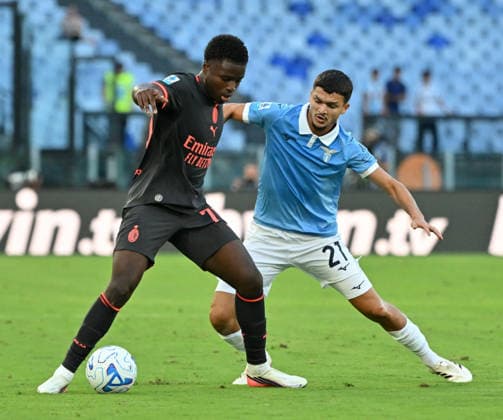IPA88449757 - Lazio s Reda Belahyane battles for the ball with Milan s Alphadjo Cisse during the 2026 2027 Italian Serie A match between SS Lazio and AC Milan at the Olympic Stadium in Rome on September 12, 2026.  Copyright: xFabrizioxCorradetti IPAxSportx xx IPA88449757