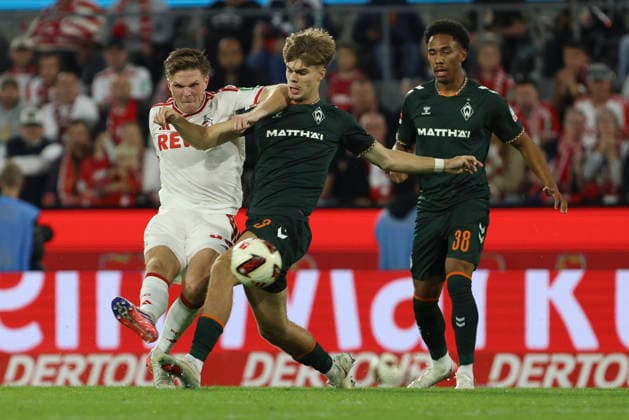 Marius Buelter (1. FC Koeln) und Mick Schmetgens (SV Werder Bremen) im Zweikampf waehrend des Spiels der 1. Bundesliga zwischen 1. FC Koeln und SV Werder Bremen, RheinEnergieStadion am 12. September 2026 in Koeln, Deutschland. (Foto von Oliver Kaelke DeFodi Images) +++ Marius Buelter (1. FC Koeln) und Mick Schmetgens (SV Werder Bremen) battle for the ball during the Bundesliga match between 1. FC Koeln and SV Werder Bremen at RheinEnergieStadion on September 12, 2026 in Cologne, Germany. (Photo by Oliver Kaelke DeFodi Images) DFB DFL REGULATIONS PROHIBIT ANY USE OF PHOTOGRAPHS AS IMAGE SEQUENCES AND OR QUASI-VIDEO. (Photo by Oliver Kaelke DeFodi Images) - *** Marius Buelter of 1. FC Köln and Mick Schmetgens of SV Werder Bremen battle for the ball during the Bundesliga match between 1. FC Köln and SV Werder Bremen at RheinEnergieStadion on September 12, 2026, in Cologne, Germany. Photo by Oliver Kaelke, DeFodi Images. Marius Buelter of 1. FC Köln and Mick Schmetgens of SV Werder Bremen battle for the ball during the Bundesliga match between 1. FC Köln and SV Werder Bremen at RheinEnergieStadion on September 12, 2026 in Cologne, Germany. Photo by Oliver Kaelke, DeFodi Images. DFB and DFL regulations prohibit any use of photographs as image sequences and or quasi-video. Photo by Oliver Kaelke, DeFodi Images