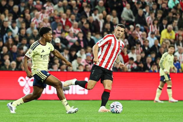 Sunderland v Arsenal Premier League Granit Xhaka of Sunderland as Myles Lewis-Skelly of Arsenal dribbles the ball during the Premier League match at the Stadium of Light, Sunderland 12 09 2026 UK Newspapers OUT Copyright: xJamiexJohnstonx FIL-23936-0047