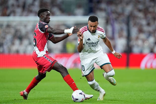 September 12, 2026, Madrid, Madrid, Spain: Kylian Mbappe of Real Madrid CF and Gnangoro Bouare Samake of Rayo Vallecano compete for the ball during the Spanish League, LaLiga EA Sports, football match played between Real Madrid and Rayo Vallecano at Bernabeu stadium on September 12, 2026, in Madrid, Spain. Real Madrid V Rayo Vallecano - LaLiga EA Sports  - ZUMAa181 20260912_zaa_a181_278 Copyright: xDennisxAgyemanx