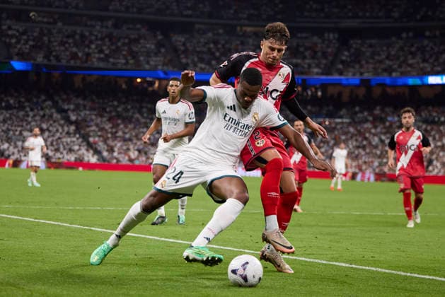 Denzel Dumfries (Real Madrid CF) and Andrei Ratiu (Rayo Vallecano) battle for the ball during the LaLiga EA Sports match between Real Madrid CF and Rayo Vallecano de Madrid at Estadio Santiago BernabÃ u on September 12, 2026 in Madrid, Spain. (Photo by Manu Reino DeFodi Images) - *** Denzel Dumfries of Real Madrid CF and Andrei Ratiu of Rayo Vallecano battle for the ball during the LaLiga EA Sports match between Real Madrid CF and Rayo Vallecano de Madrid at Estadio Santiago Bernabéu on September 12, 2026, in Madrid, Spain. Photo by Manu Reino, DeFodi Images
