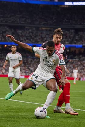 Denzel Dumfries (Real Madrid CF) and Andrei Ratiu (Rayo Vallecano) battle for the ball during the LaLiga EA Sports match between Real Madrid CF and Rayo Vallecano de Madrid at Estadio Santiago BernabÃ u on September 12, 2026 in Madrid, Spain. (Photo by Manu Reino DeFodi Images) - *** Denzel Dumfries of Real Madrid CF and Andrei Ratiu of Rayo Vallecano battle for the ball during the LaLiga EA Sports match between Real Madrid CF and Rayo Vallecano de Madrid at Estadio Santiago Bernabéu on September 12, 2026, in Madrid, Spain. Photo by Manu Reino, DeFodi Images
