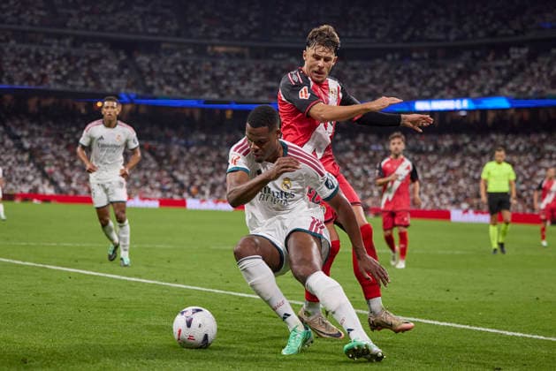 Denzel Dumfries (Real Madrid CF) and Andrei Ratiu (Rayo Vallecano) battle for the ball during the LaLiga EA Sports match between Real Madrid CF and Rayo Vallecano de Madrid at Estadio Santiago BernabÃ u on September 12, 2026 in Madrid, Spain. (Photo by Manu Reino DeFodi Images) - *** Denzel Dumfries of Real Madrid CF and Andrei Ratiu of Rayo Vallecano battle for the ball during the LaLiga EA Sports match between Real Madrid CF and Rayo Vallecano de Madrid at Estadio Santiago Bernabéu on September 12, 2026, in Madrid, Spain. Photo by Manu Reino, DeFodi Images