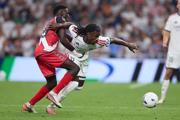 Eduardo Camavinga (Real Madrid CF) and Gnangoro Bouare (Rayo Vallecano) battle for the ball during the LaLiga EA Sports match between Real Madrid CF and Rayo Vallecano de Madrid at Estadio Santiago BernabÃ u on September 12, 2026 in Madrid, Spain. (Photo by Manu Reino DeFodi Images) - *** Eduardo Camavinga of Real Madrid CF and Gnangoro Bouare of Rayo Vallecano battle for the ball during the LaLiga EA Sports match between Real Madrid CF and Rayo Vallecano de Madrid at Estadio Santiago Bernabéu on September 12, 2026, in Madrid, Spain. Photo by Manu Reino, DeFodi Images