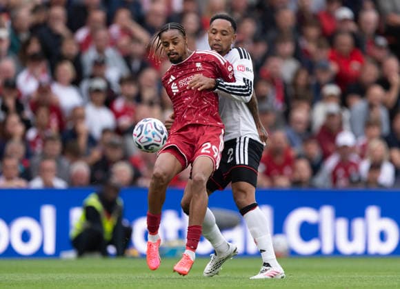 Liverpool v Fulham - Premier League 2026 27 LIVERPOOL, ENGLAND - SEPTEMBER 12: Bradley Barcola of Liverpool and Kenny Tete of Fulham in action during the Premier League 2026 27 match between Liverpool FC and Fulham at Anfield on September 12, 2026 in Liverpool, England. Bradley Barcola; Kenny Tete Liverpool Anfield England United Kingdom Copyright: xVisionhausx 776515686