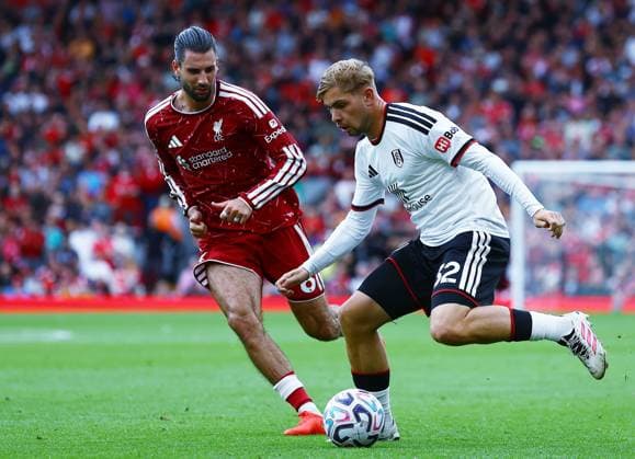 Emile Smith Rowe of Fulham and Dominik Szoboszlai of Liverpool Liverpool v Fulham, Premier League, Football, Football, Anfield, Liverpool, UK - 12 Sep 2026Liverpool Anfield United Kingdom EDITORIAL USE ONLY No use with unauthorised audio, video, data, fixture lists, club league logos or live services. Online in-match use limited to 120 images, no video emulation. No use in betting, games or single club league player publications. Copyright: xMattxWest Shutterstockx 17144551eo