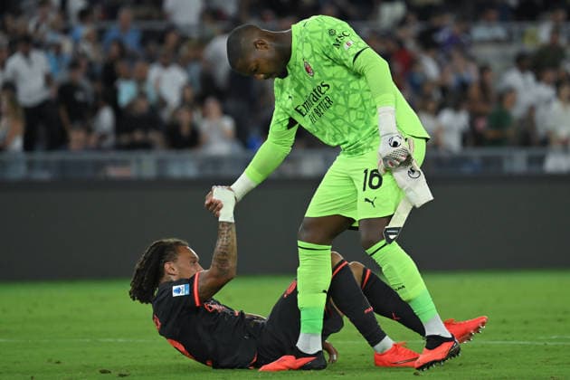 Soccer, Serie A match , Lazio v Milan Diego Moreira of Milan,Mike Maignan of Milan during the Serie A match between Lazio v Milan at Olympic stadium. Rome (Italy), September 12h, 2026 Imago-Images Emmefoto Copyright: xImago-Images Emmefotox