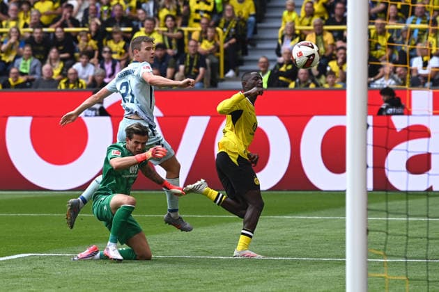 Serhou GUIRASSY (DO) erzielt ein Abseitstor das nicht zaehlt, gegen Torwart Nahuel NOLL (PB) Fussball 1. Bundesliga, 3.Spieltag, matchday3, Spieltag3, Borussia Dortmund (DO) - SC Paderborn (PB) 3-0 am 12.09.2026 in Dortmund Deutschland. DFL regulations prohibit any use of photographs as image sequences and or quasi-video Â *** Serhou GUIRASSY DO scores an offside goal that does not count against goalkeeper Nahuel NOLL PB Soccer 1 Bundesliga, Matchday 3, matchday3, Spieltag3, Borussia Dortmund vs. SC Paderborn PB 3–0 on September 12, 2026, in Dortmund, Germany. DFL regulations prohibit any use of photographs as image sequences and or quasi-video.
